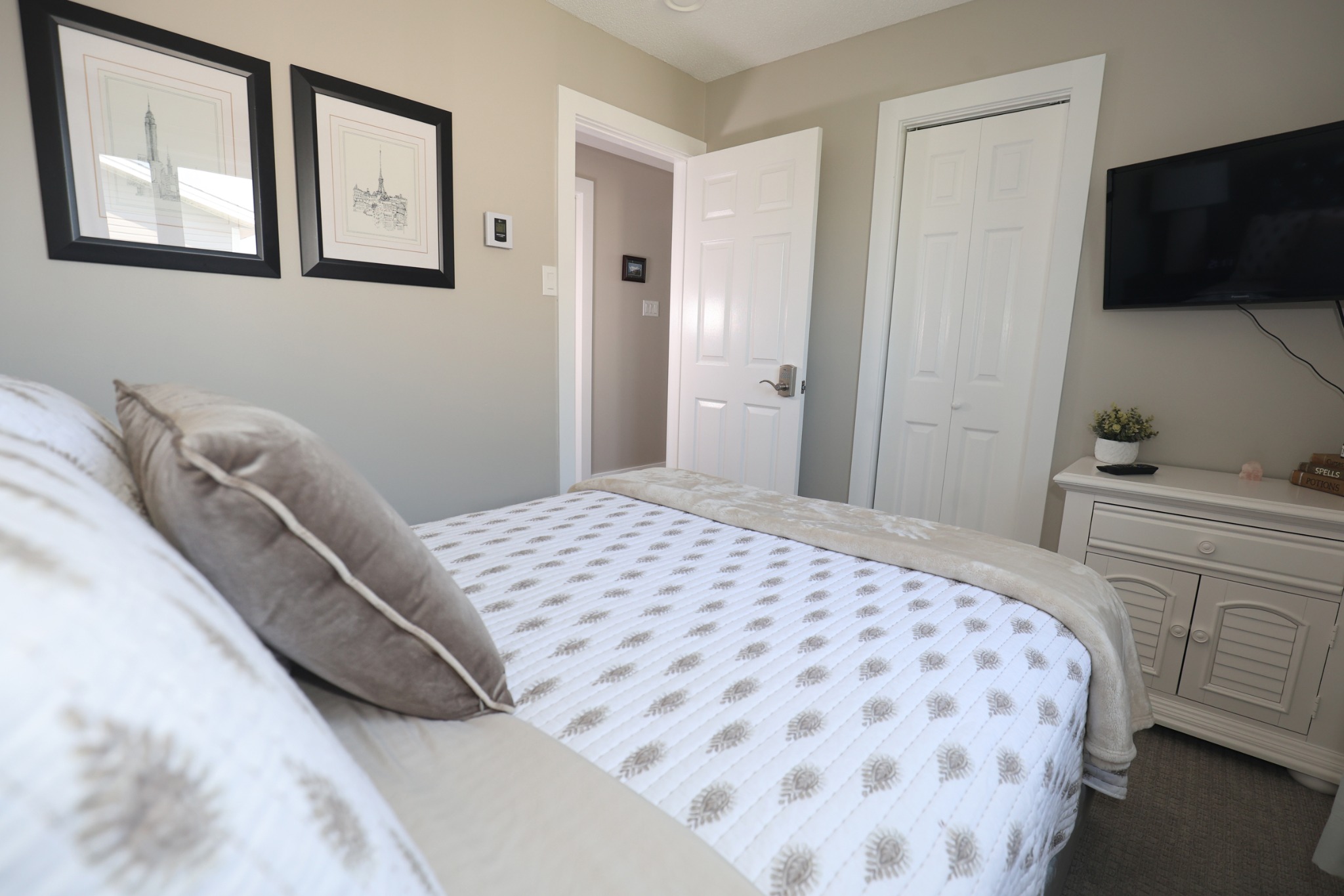 Relaxing neutral bedroom at Doyle's Haven