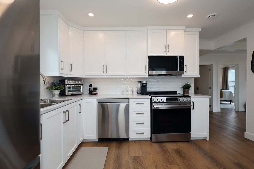Bright white kitchen at The Harbour House